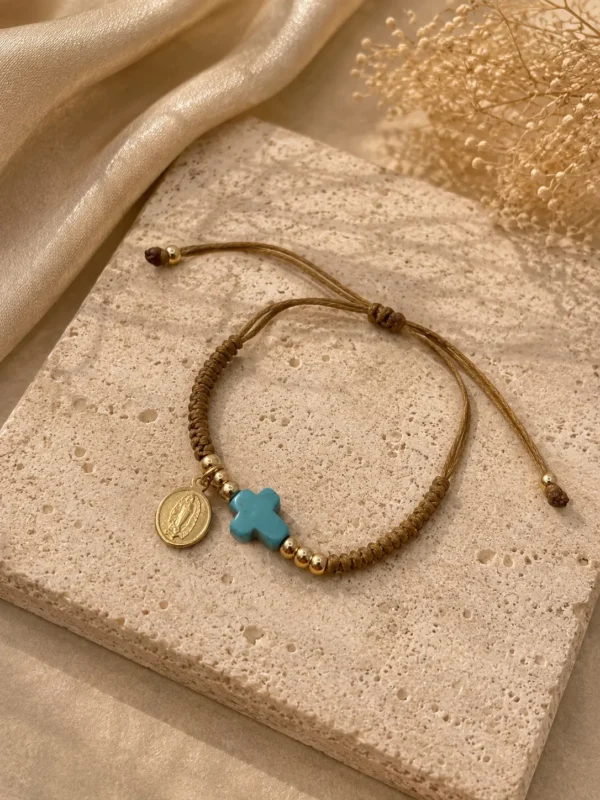 ChatGPT Image Jul 1, 2026, 03_59_45 PM Handmade Tan String Bracelet with Aqua Cross
