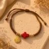 ChatGPT Image Jul 1, 2026, 04_03_55 PM Handmade Tan String Bracelet with Red Cross