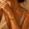 ChatGPT Image Jul 5, 2026, 08_06_18 PM Handmade Tan String Bracelet with Yellow Cross