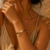 ChatGPT Image Jul 5, 2026, 08_17_12 PM Handmade Tan String Bracelet with Tan Cross