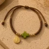 ChatGPT Image Jul 5, 2026, 08_36_31 PM Handmade Bracelet String Tan Cross Green